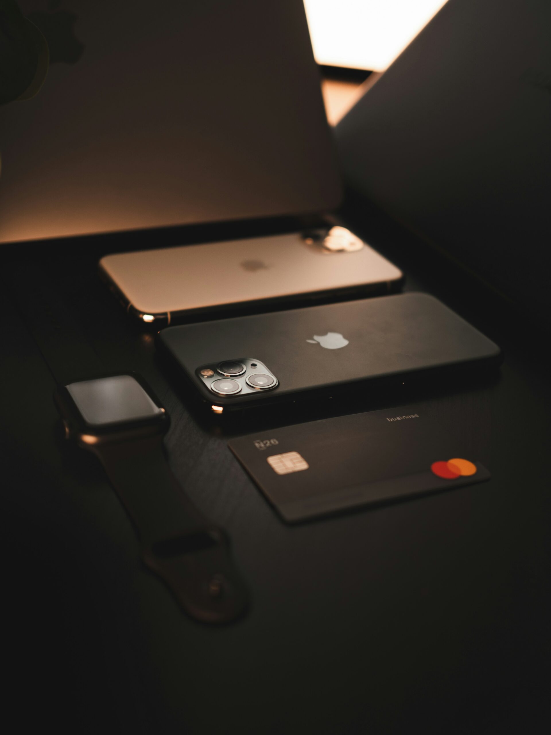 An image of iPhones, an apple watch and payment card. E-Commerce Shop Design with WooCommerce in New Braunfels, San Marcos and Kyle | Designs By Guerrero